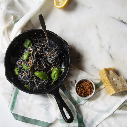 Squid Ink Pasta with Crispy Pancetta, Parmigiano and Basil